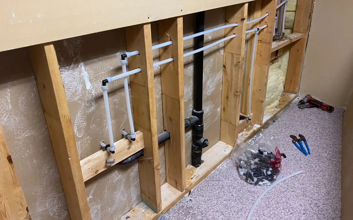New replacement water lines in the same wall section during a repipe in Upper Lonsdale, North Vancouver